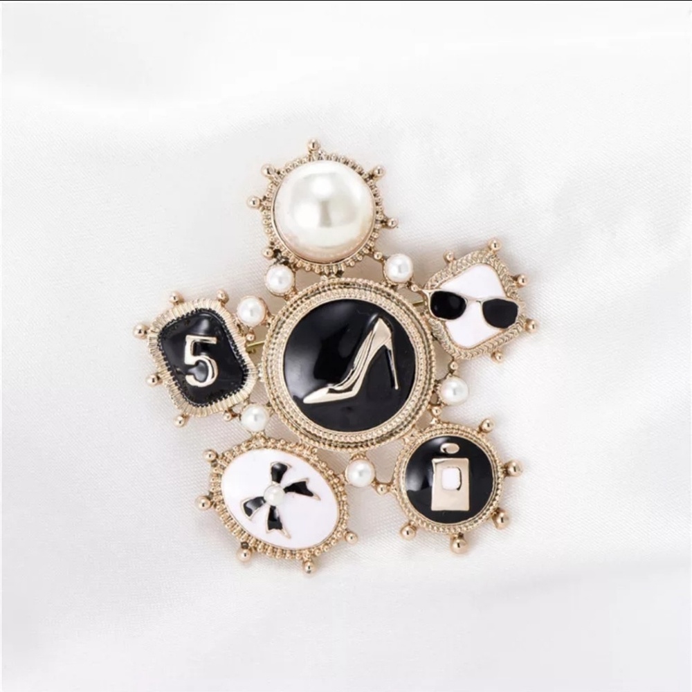 Statement designer pump bow no 5 paris brooch